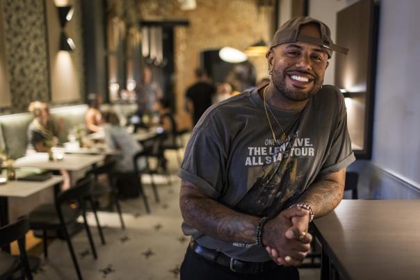Billy Weathers poses in his cocktail bar, The Contrary