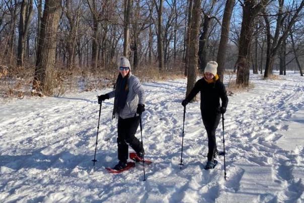 Two People Snowshoeing In Des Moines, IA