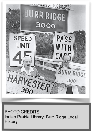 A historical roadside sign marking the change from Harvester to Burr Ridge, showing the updated village name and reflecting the area’s transition over time.