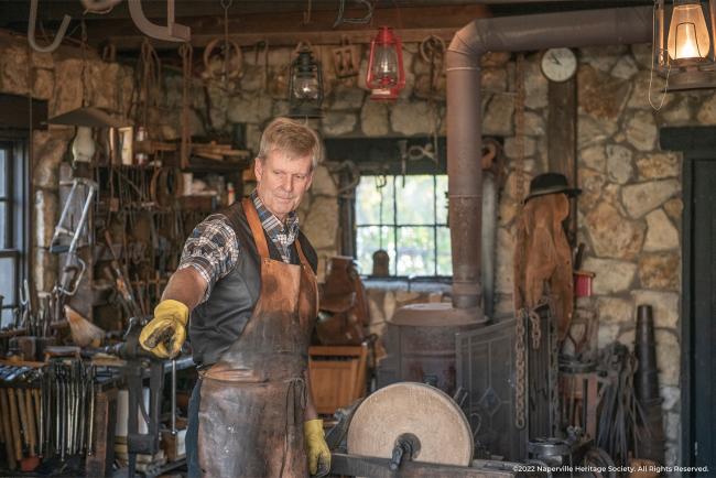 A blacksmith giving a demonstration