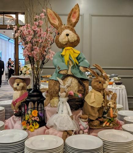 cute sculptures of bunnies surrounded by plates