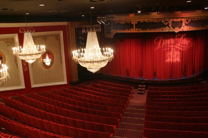 Balcony Shot of seats and stage curtains at Drury Lane Theatre in DuPage County