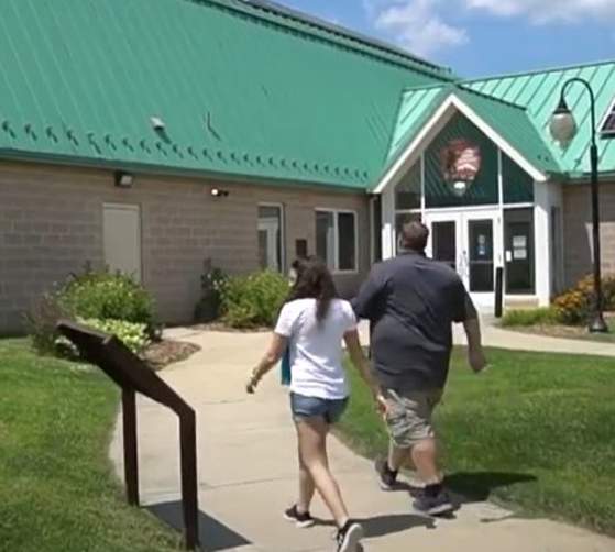 Man and woman walking to the entrance of Antietam Civil War Building