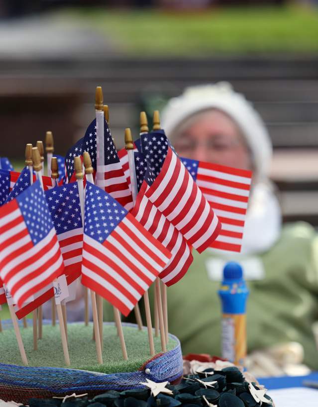 American flags at the America 250 History Fair on Carroll Creek