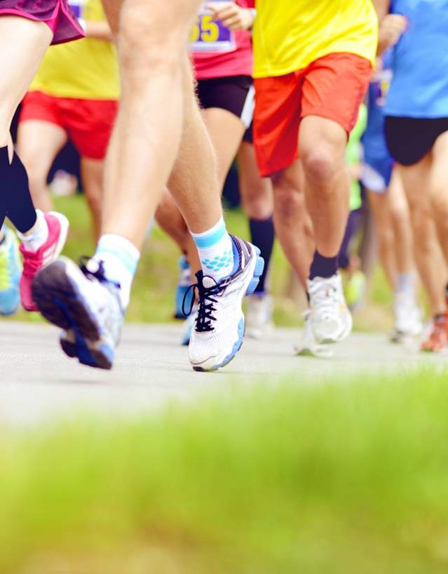 Colorful sneakers of runners at Baker Park