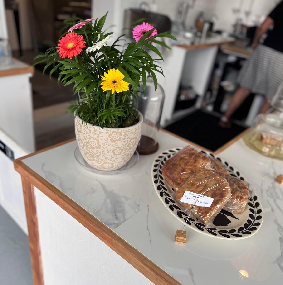 Flowers and baked goods at The Station Cafe