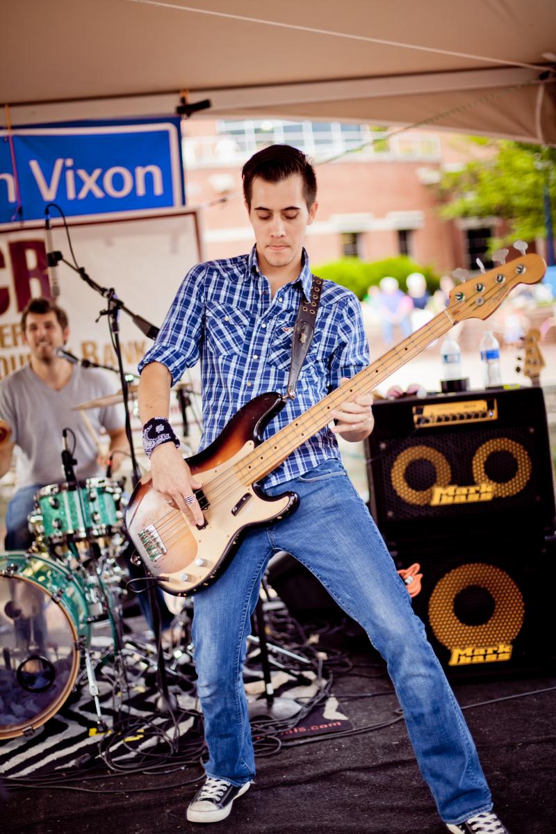 A man playing guitar at Alive at Five 