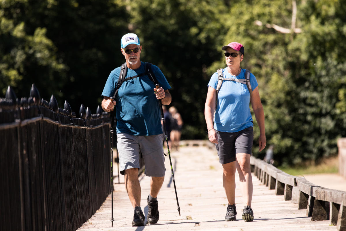 Two People Walking C&O Canal 
