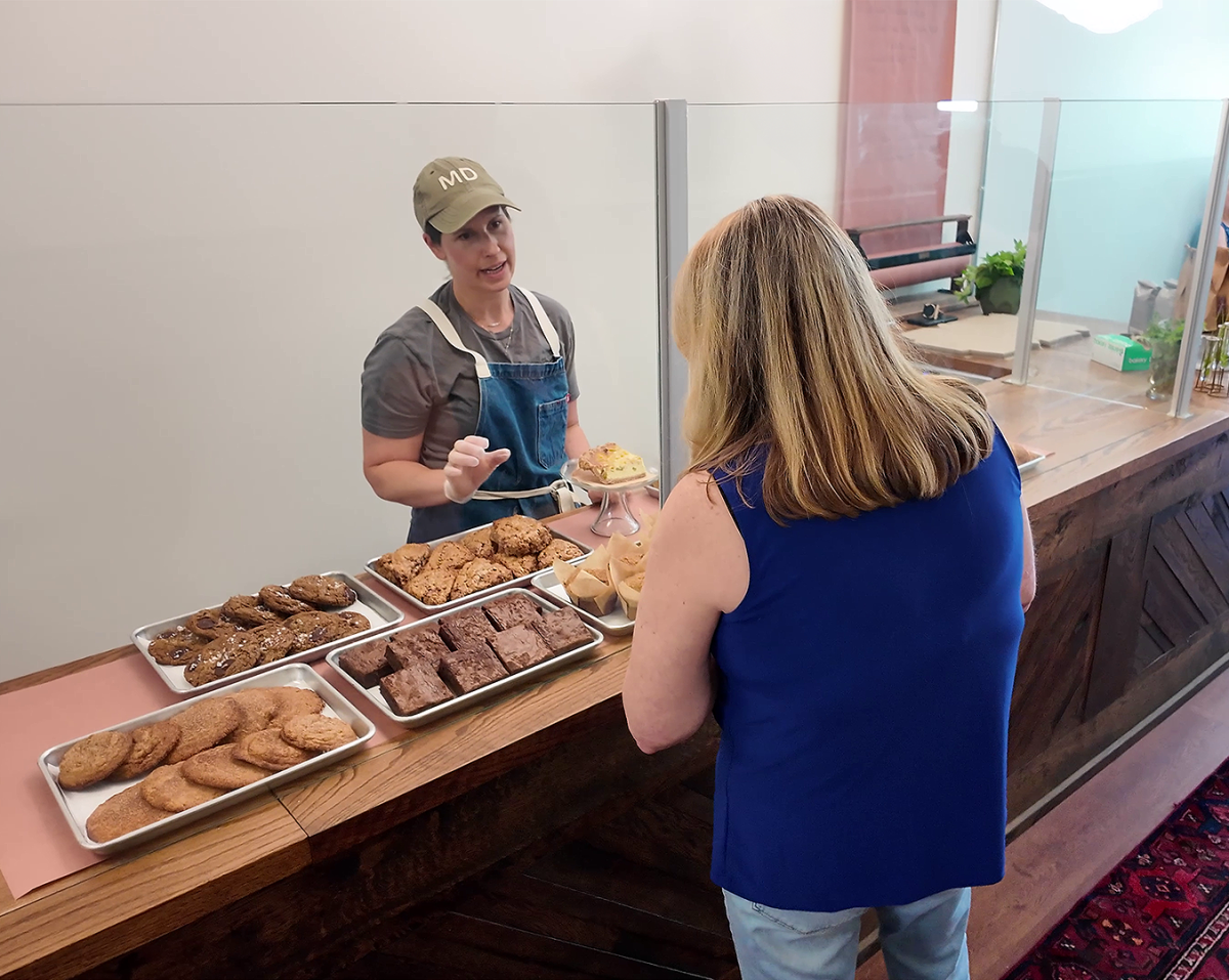 Customer ordering at Maple & Rye Bakery in Brunswick, MD