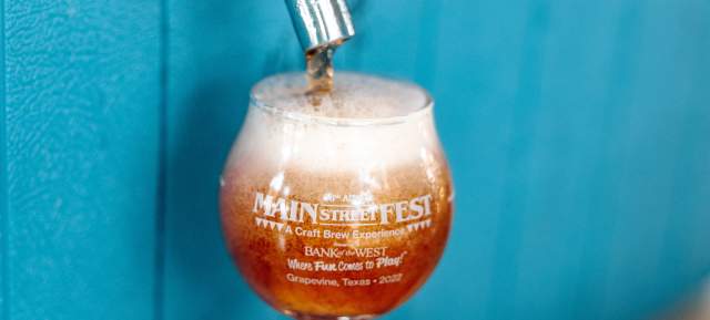 glass of craft brew getting filled