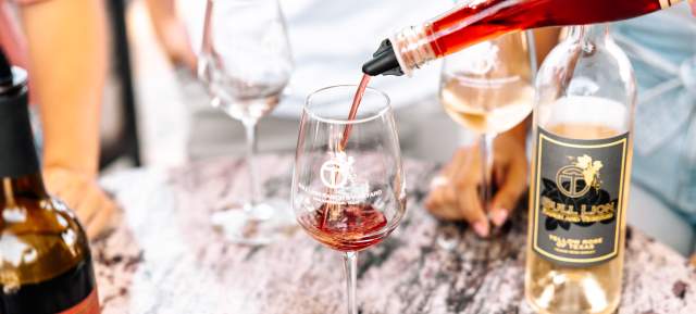 wine being poured into a glass