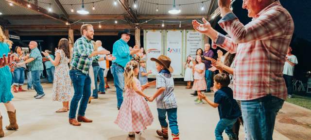 People enjoying a barn dance at Nash Farm in Grapevine, Texas
