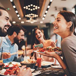 People eating food at a restaurant