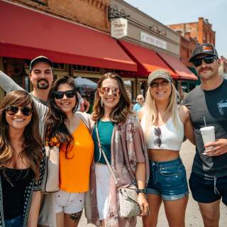 Group of people attending Main Street Fest in Grapevine, Texas