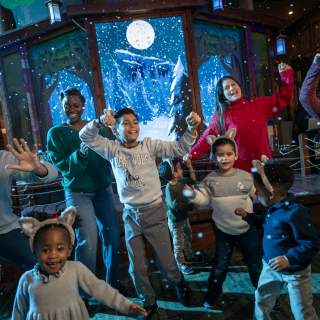 Families enjoying Snowland at Great Wolf Lodge in Grapevine, Texas