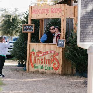 Christmas Capital of Texas mistletoe booth