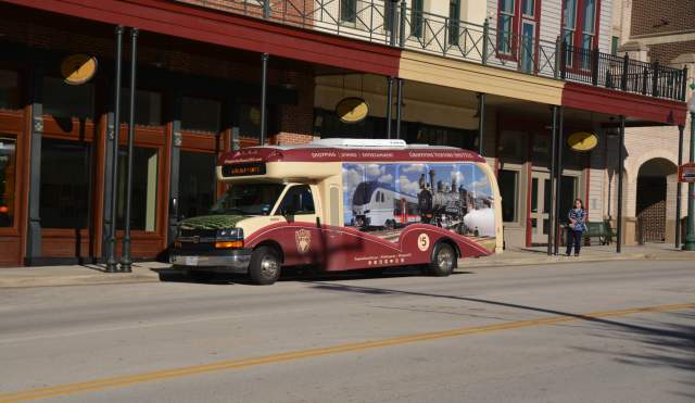 grapevine visitors shuttle parked on main street