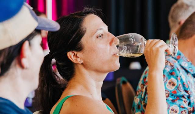 Woman enjoying wine at GrapeFest in Grapevine, Texas