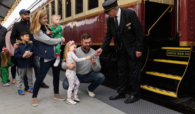 Families boarding Santa's North Pole Express in Grapevine, Texas