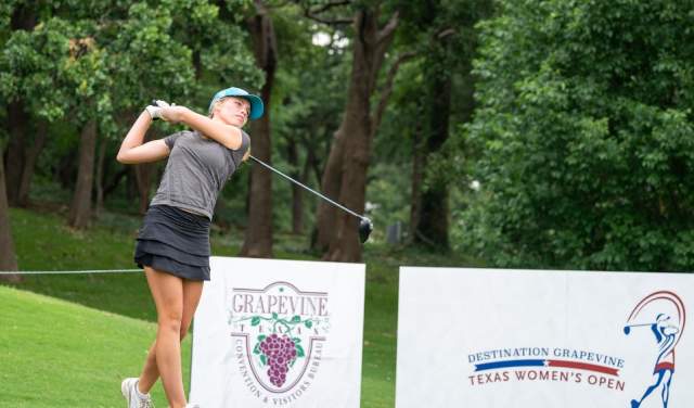 Golfer taking a shot during the Destination Grapevine Texas Women's Open in Grapevine, Texas