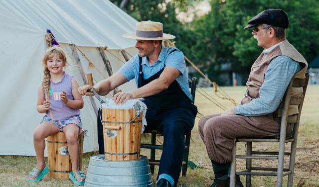 People enjoying an ice cream social at Historic Nash Farm in Grapevine, Texas