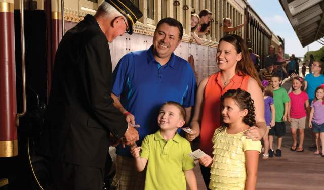 Family boarding Grapevine Vintage Railroad train in Grapevine, Texas