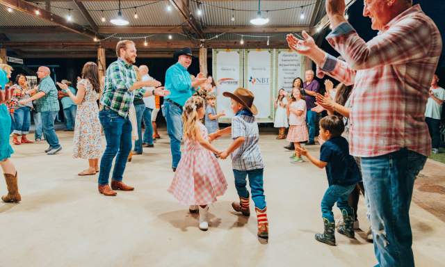 People enjoying a barn dance at Nash Farm in Grapevine, Texas