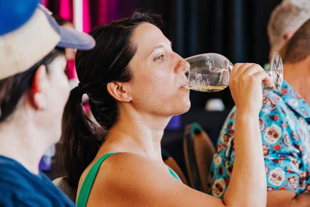 Woman enjoying wine at GrapeFest in Grapevine, Texas