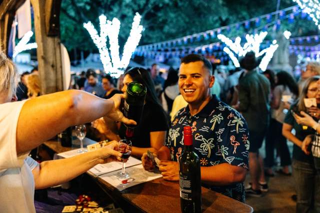 Wine being poured at GrapeFest Liberty Park Plaza International Wine Experience