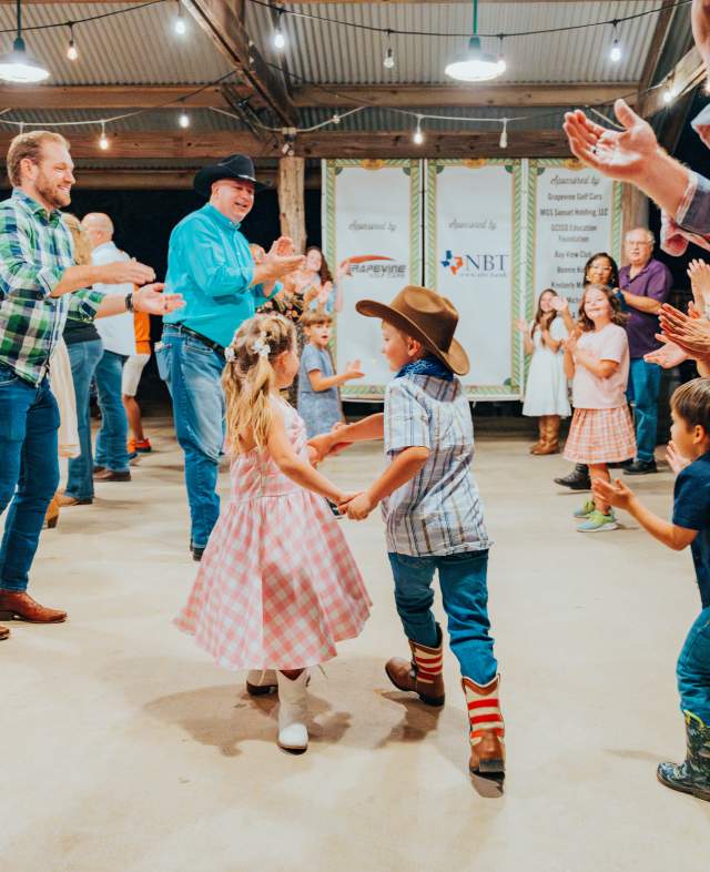 People enjoying a barn dance at Nash Farm in Grapevine, Texas
