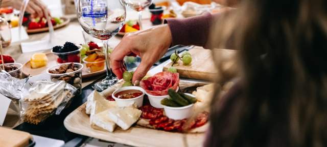 Arranging a board at a Charcuterie Board Workshop