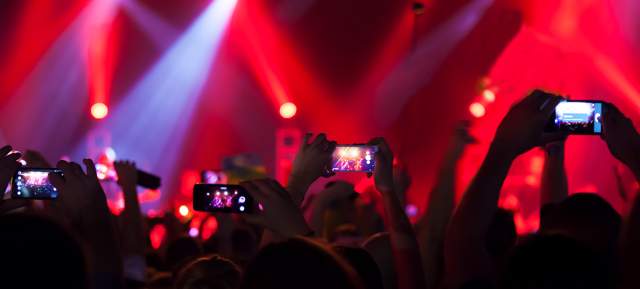 Crowd with Cell Phones up at Live Music Performance at GrapeFest