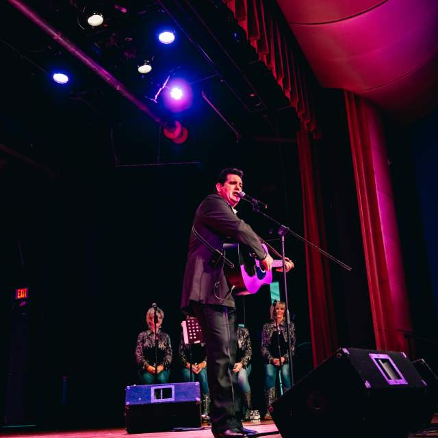 Johnny Cash Tribute Band Performing Live on Stage