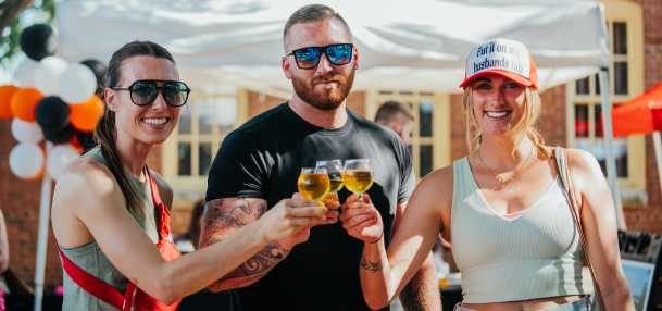 People enjoying some craft brews at Main Street Fest in Grapevine, Texas