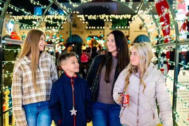 Family attending Carol of Lights during Grapevine's Christmas Capital of Texas