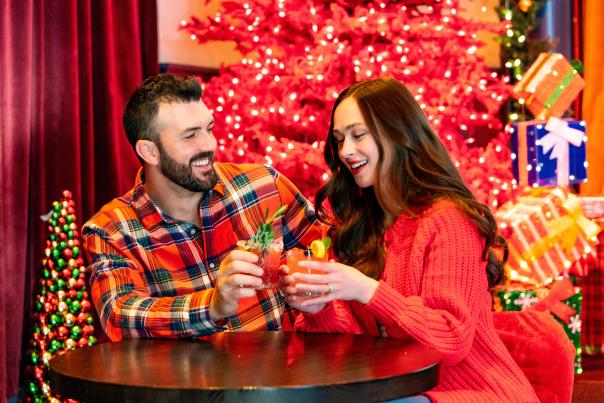 A couple enjoying drinks during the Christmas Capital of Texas in Grapevine, Texas