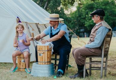 People enjoying an ice cream social at Historic Nash Farm in Grapevine, Texas
