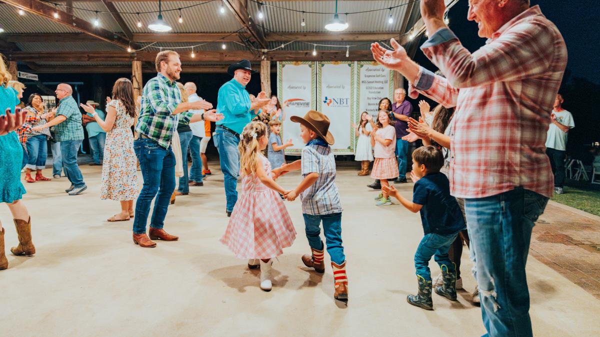 People enjoying a barn dance at Nash Farm in Grapevine, Texas