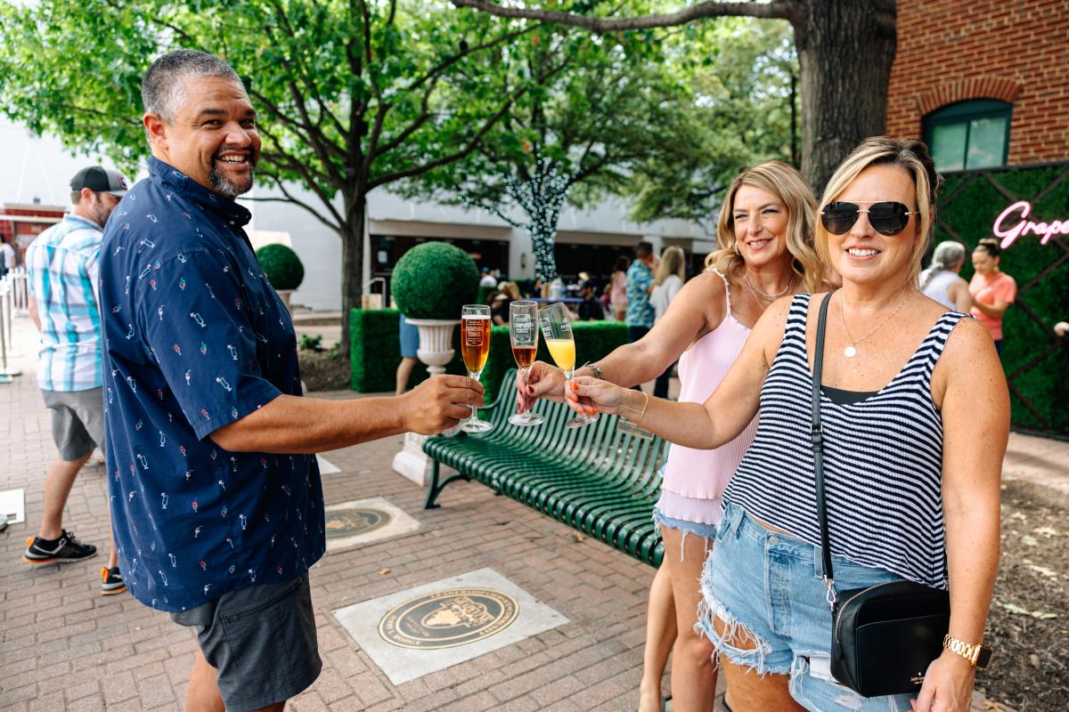 People enjoying GrapeFest Champagne Terrace area