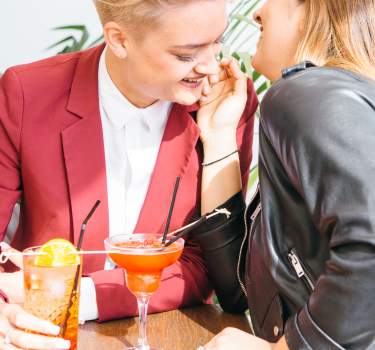 Couple having cocktails