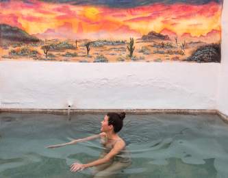 A private mineral hot spring pool at Delight's Hot Springs in Tecopa, California