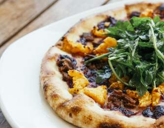 Kitchen 86 + Bar specialty pizza