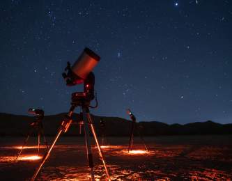 Telescopes and the night sky on a tour with Stargazing Joshua Tree