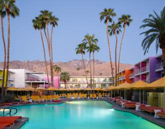 The pool area with the San Jacinto Mountains in the background at The Saguaro in Palm Springs