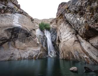 The Tahquitz Canyon waterfall flows heavily after a storm