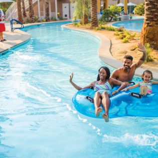 Family tubing on a lazy river
