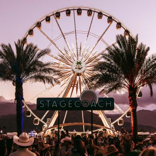The Stagecoach sign with the ferris wheel and palm trees in the background.
