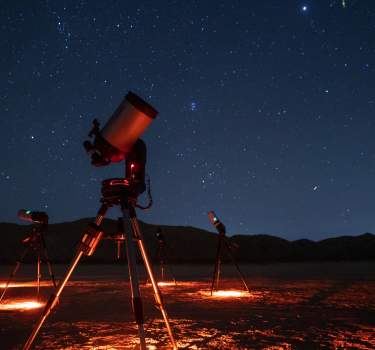 Telescopes and the night sky on a tour with Stargazing Joshua Tree