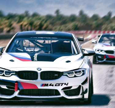 Cars racing along the BMW Performance Center track
