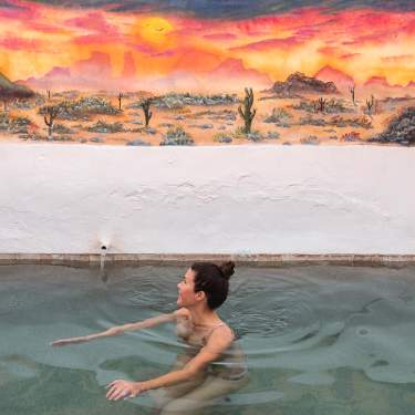 A private mineral hot spring pool at Delight's Hot Springs in Tecopa, California